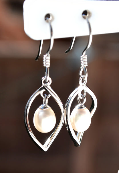 Sterling Silver 925 Genuine Freshwater White 7x6mm Oval Pearl Twist Hookwire Earrings