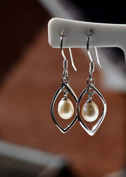 Sterling Silver 925 Genuine Freshwater White 7x6mm Oval Pearl Twist Hookwire Earrings