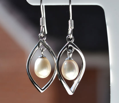 Sterling Silver 925 Genuine Freshwater White 7x6mm Oval Pearl Twist Hookwire Earrings