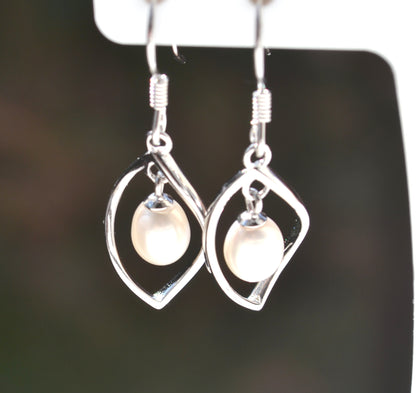 Sterling Silver 925 Genuine Freshwater White 7x6mm Oval Pearl Twist Hookwire Earrings